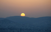 Sunset over Athens suburbs